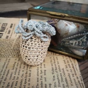 Antique 1920s sented knit sachet.